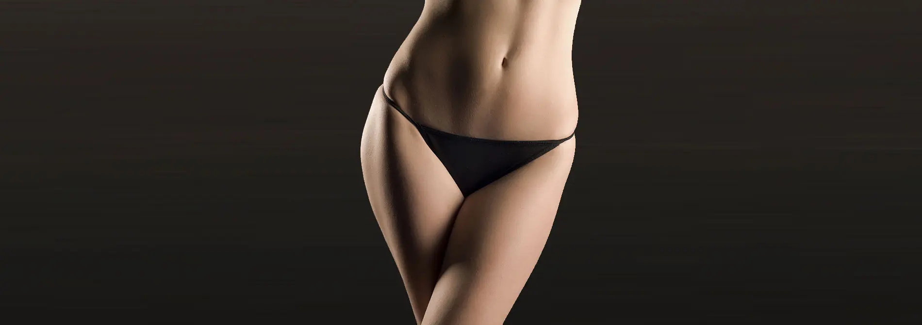 91420000-edited Image of woman in bikini on dark background